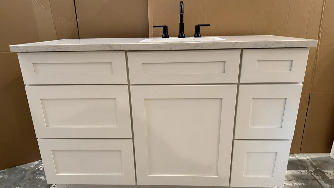 Wellborn 55" six-drawer vanity with Quartz top, sink, and faucet MSRP $2,250 - Used, excellent condition - see pics