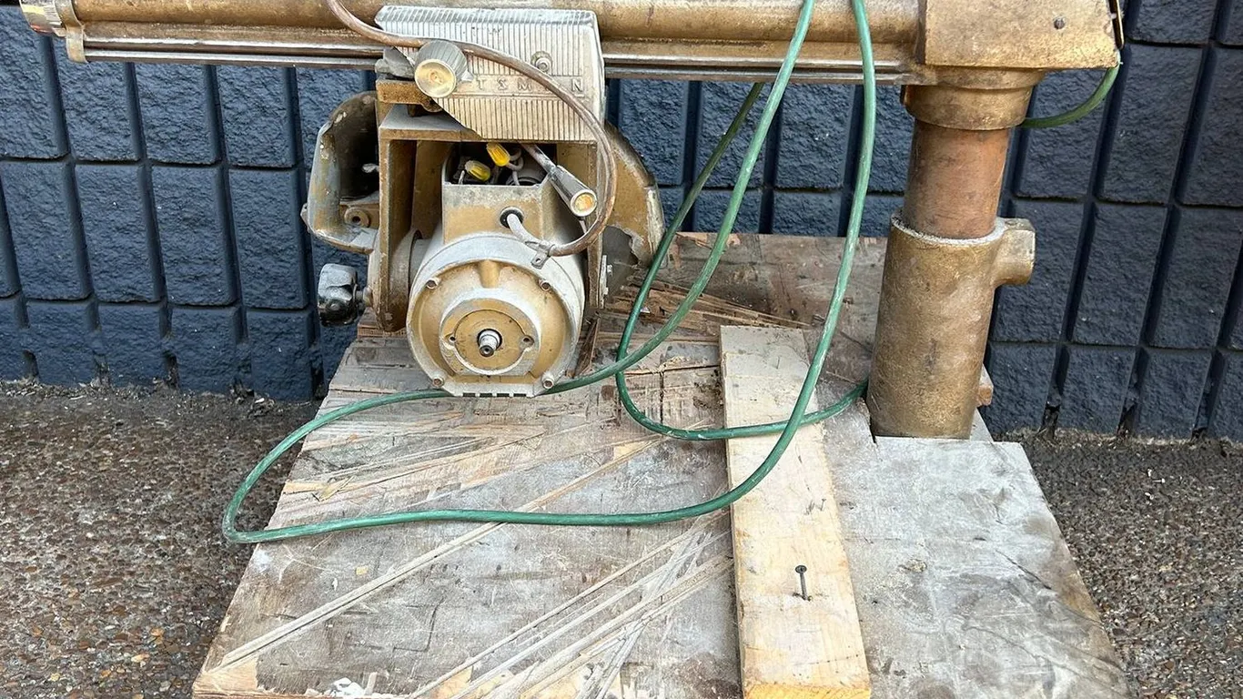 Vintage Craftsman Radial Arm Saw on Wood Table