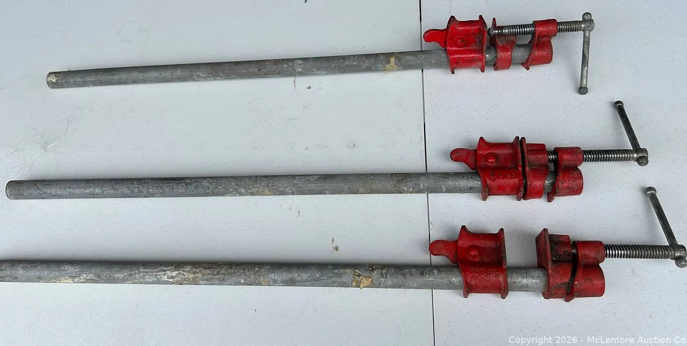 Three 3/4" Pipe Clamps With Red Cast Heads