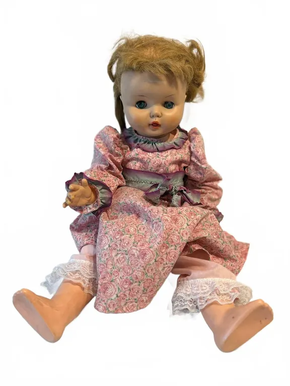Vinyl Doll with Pink Floral Dress and Blonde Hair