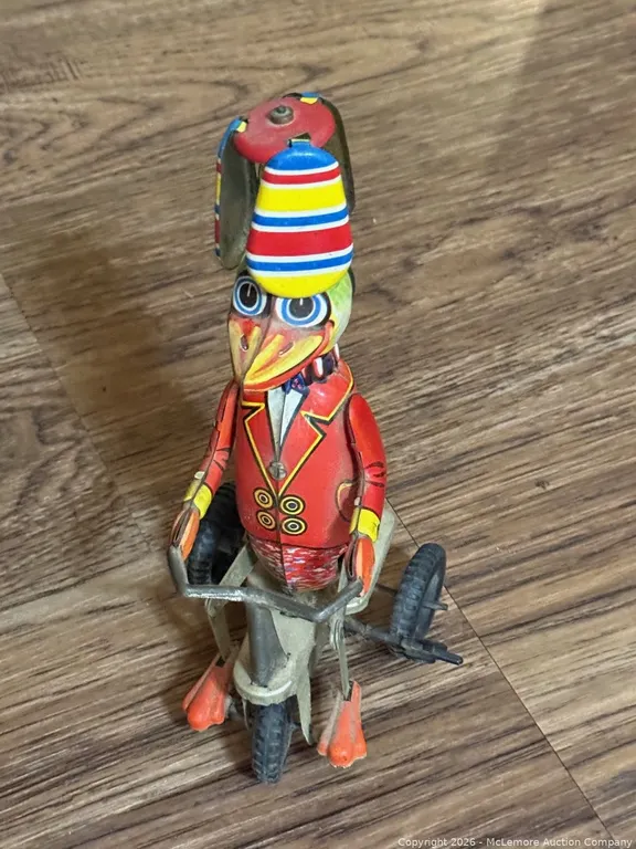 Wind-Up Spinning Tin Toy