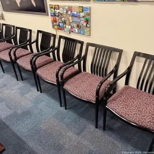Seven Upholstered Office Chairs, Black Lacquer Frames