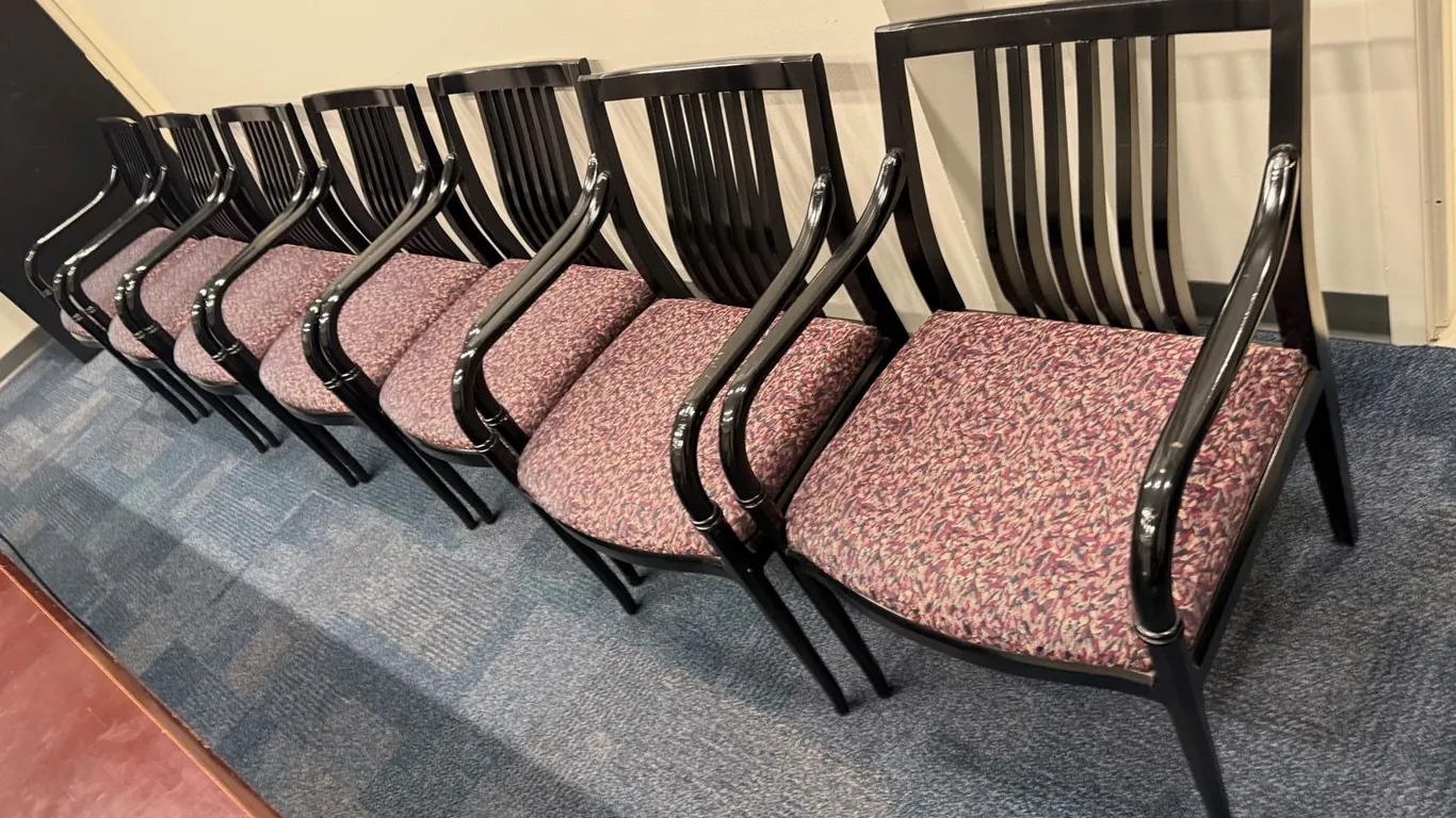 Seven Upholstered Office Chairs, Black Lacquer Frames