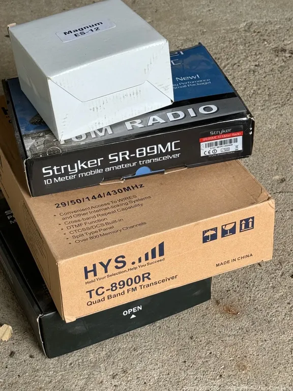 Four Boxes of CB Radios