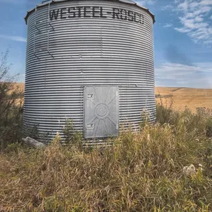 *OFFSITE*  WESTEEL BIN 14' DIAMETER 17' TALL - 1650 BUSHEL BIN *NOTE: FLOOR IS ROTTEN BUT INTACT*  *LOCATED SW SEC. 9, TWP. 33, RGE 21 W4M - APPROX. 5