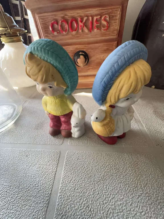 Boy and Girl Ceramic Figurines with Animals