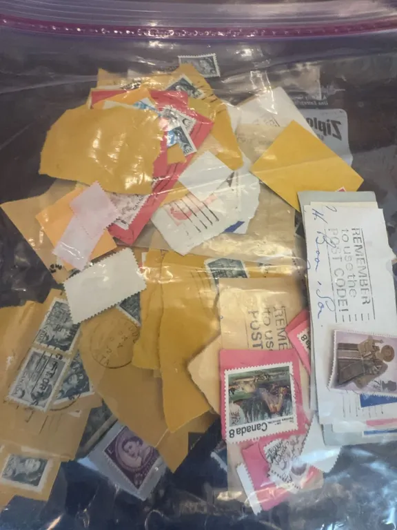 Bag of Mixed Used Postage Stamps on Paper Including Canada and International