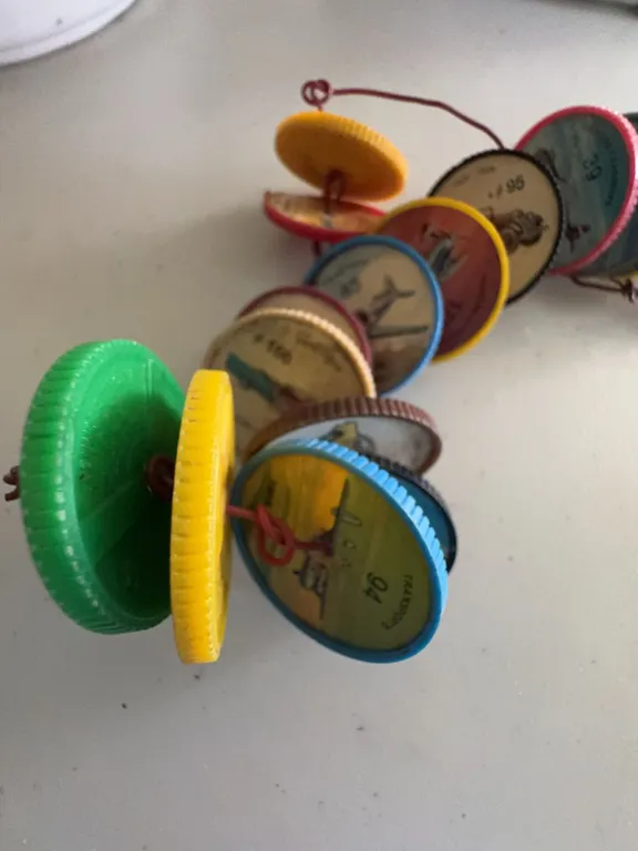 Vintage Transogram Collectible Game Discs on Wire