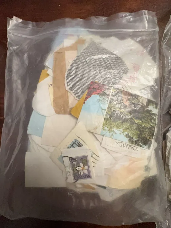 Used Canada and International Postage Stamps in Plastic Bag
