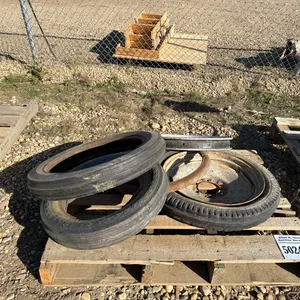 3 - VINTAGE TIRES - NO RIMS, 1 - VINTAGE TIRE w/ ANTIQUE TRACTOR RIM
