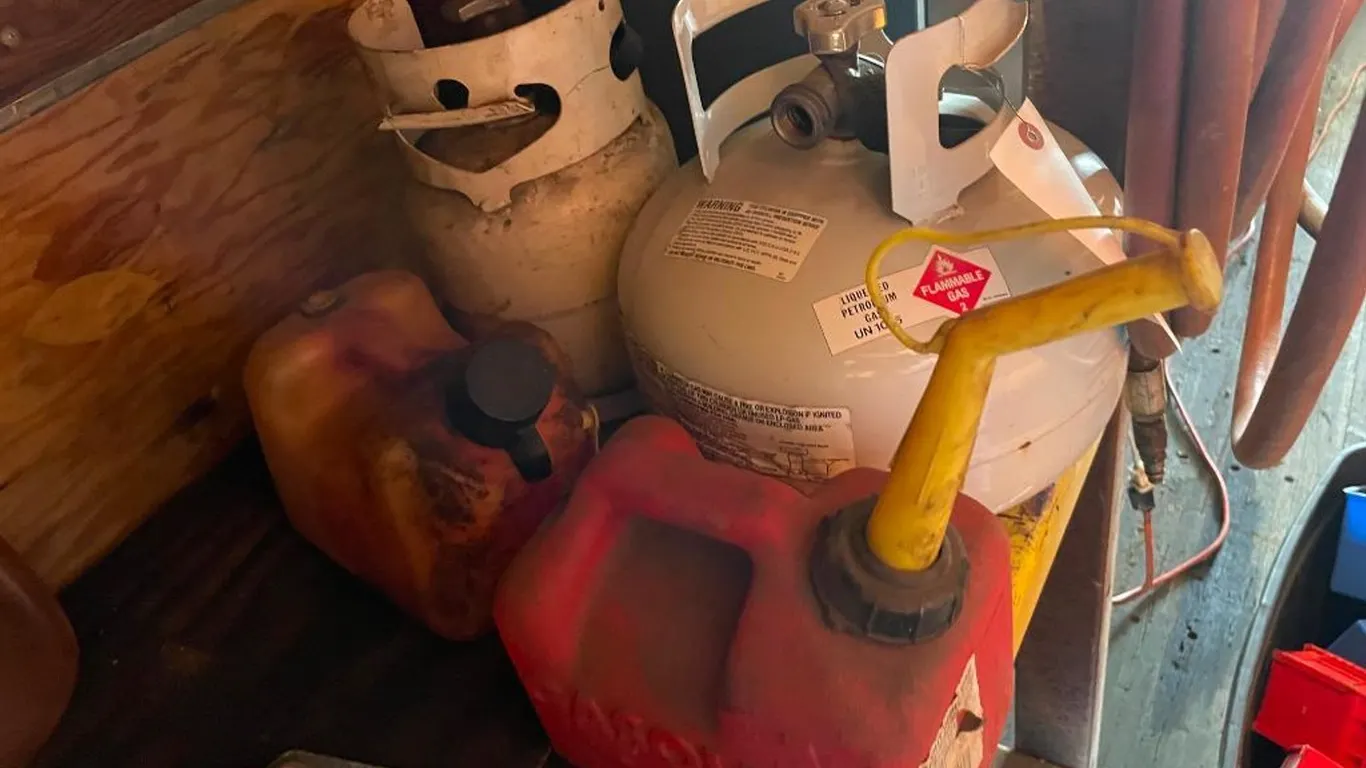 (2) LP Tanks and (2) Gas Cans