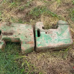 (4) John Deere Suitcase Weights