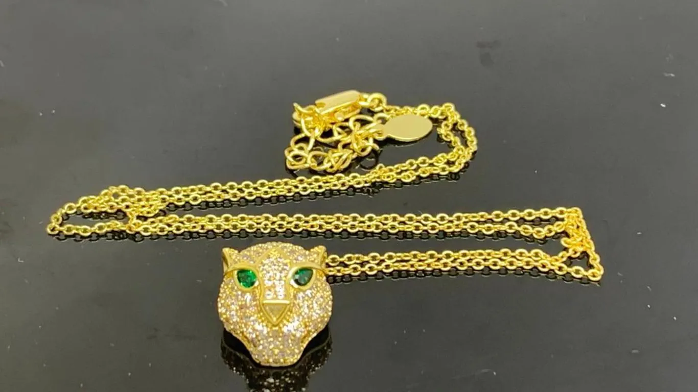 Gold Tone Panther Pendant