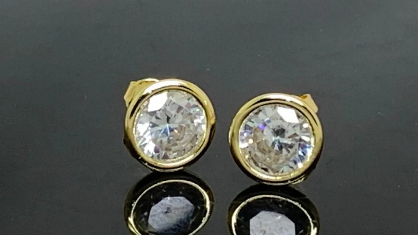 Gold Tone Earrings With Clear Stones