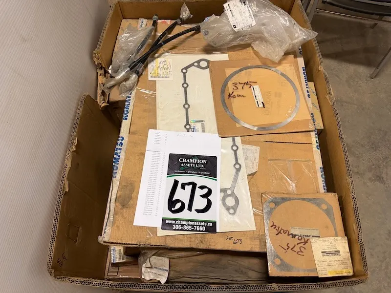 Asst Komatsu Parts in large wood box