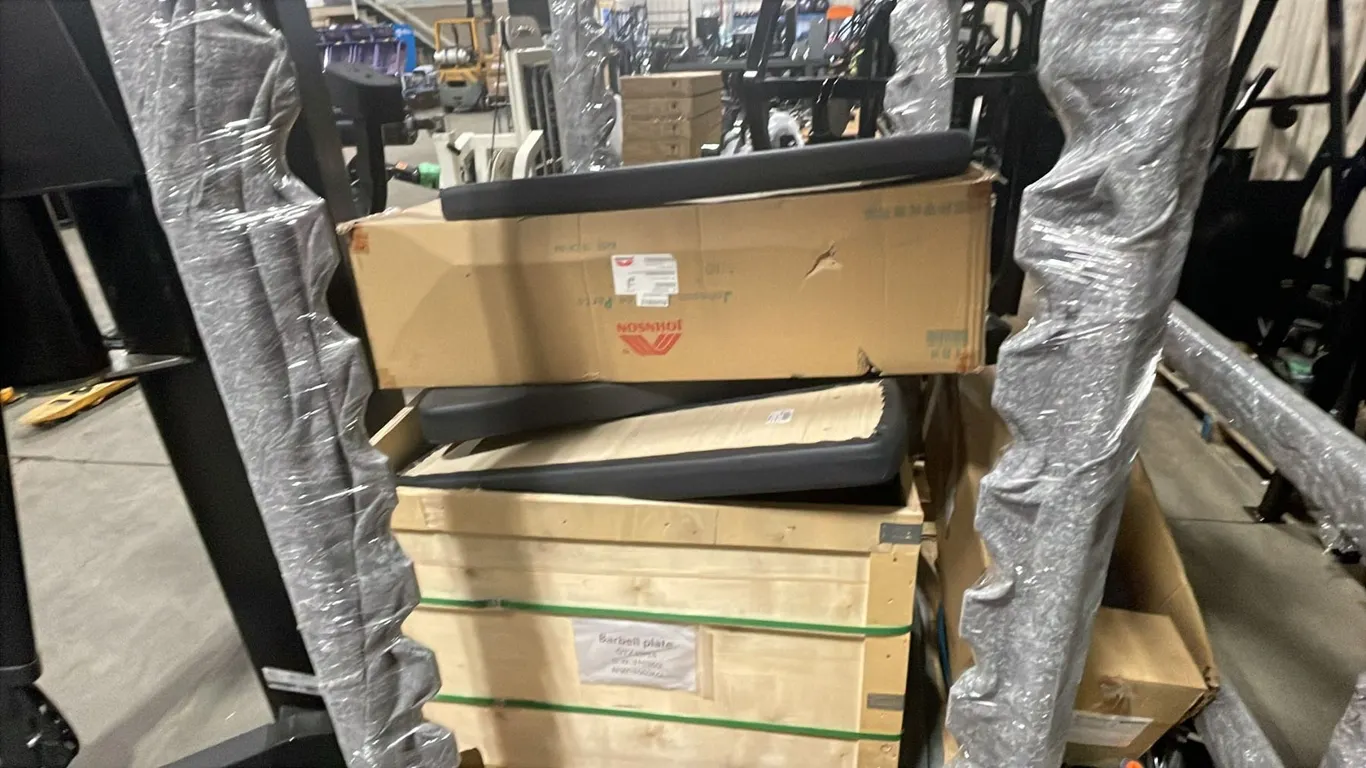 WOODEN PALLET CRATE OF ASSORTED COMMERCIAL EXERCISE MACHINE CUSHIONS