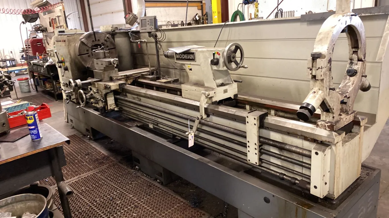 MODERN 9" HOLLOW SPINDLE LATHE. MODEL 33 SERIES. 3 PHASE. 15HP. 16'4" OVERALL LENGTH.