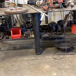 8' X 4' WELDING TABLE. 3/4" SOLID TOP. ADJUSTABLE LEGS. HEAVY. INC 6" IRWIN VISE.