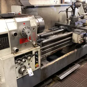 MODERN LA 560 X 2000 LATHE. 3 PHASE. COMES WITH ASST TOOLING, QUICK RELEASE TOOLING MOUNT,
