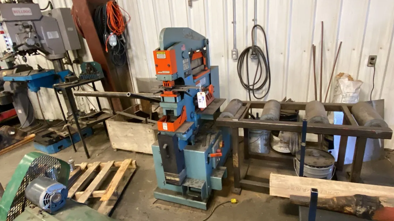 SCOTCHMAN IRON WORKER. MODEL 50514-CM 3 HP WITH MANUAL. INC 4' FEED TABLE.