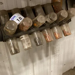 WELDING TIP WALL MOUNT STORAGE UNIT. 24 COMPARTMENTS. INCLUDES LARGE ASST OF TIPS