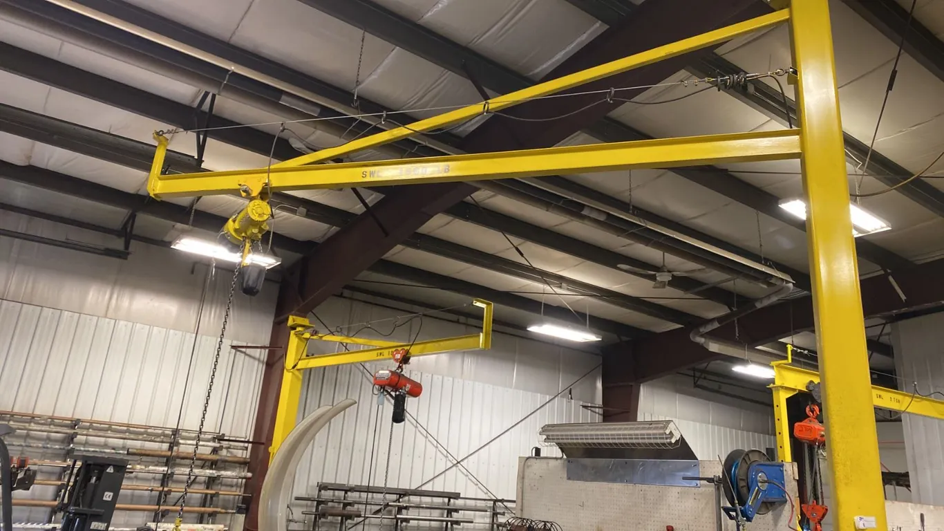 1.5 TON JIB CRANE. INSPECTED ANNUALLY. 12' BOOM VULCAN HOIST.