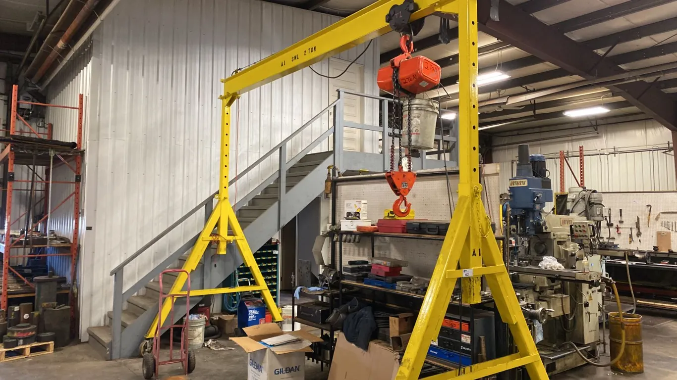 ROLLING CRANE. 2 TON, 179" WIDE X 148" HIGH WITH WIRED REMOTE