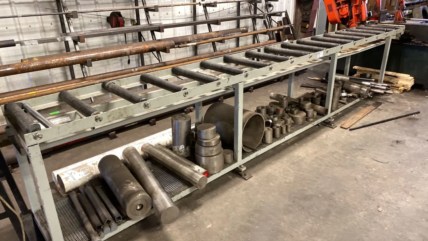 16' ROLLER FEED TABLE. 35 1/2" HIGH. ADJUSTABLE LEVELERS.
