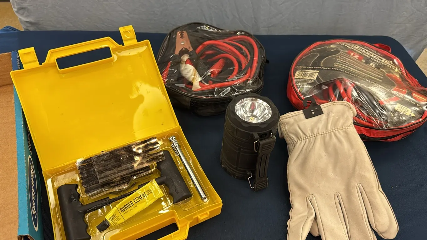 Jumper cables, gloves, tire kit