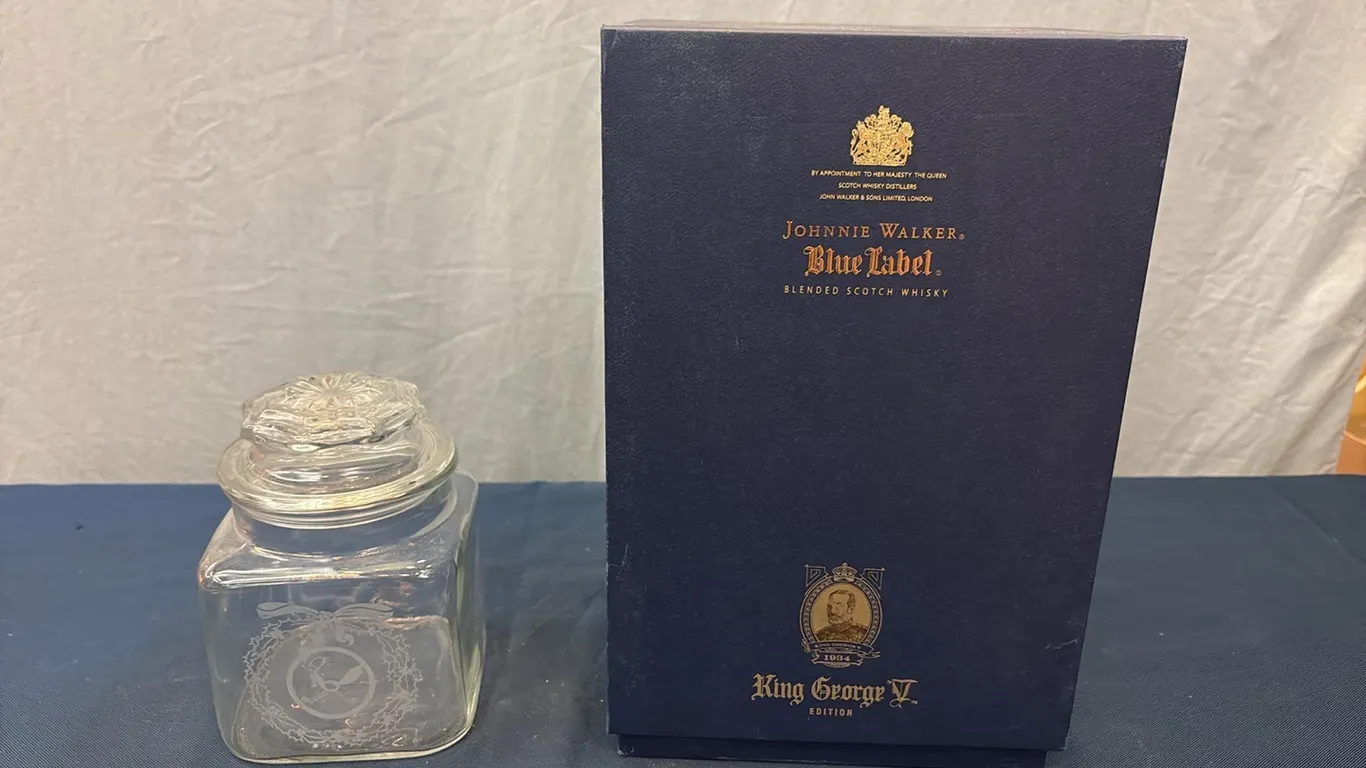 Glass Jar & Empty Johnnie Walker Bottle