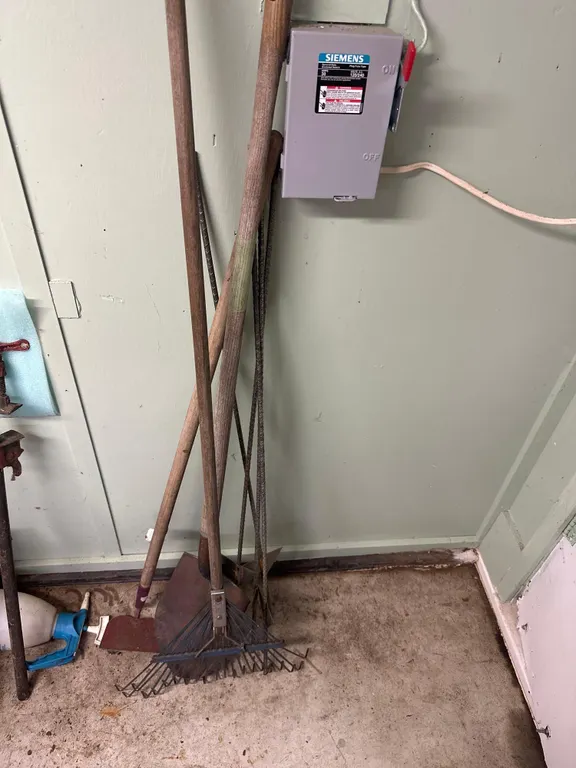 garden tools and fence posts