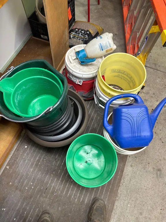 misc buckets and flower pots