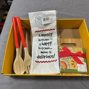 Towel, wood spoons, cutting board