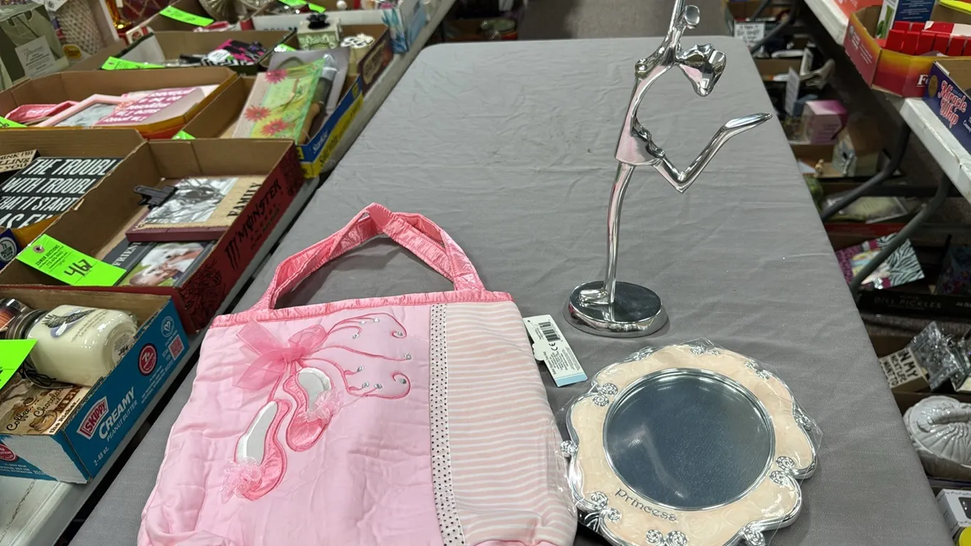 Figurine, frame, slipper bag