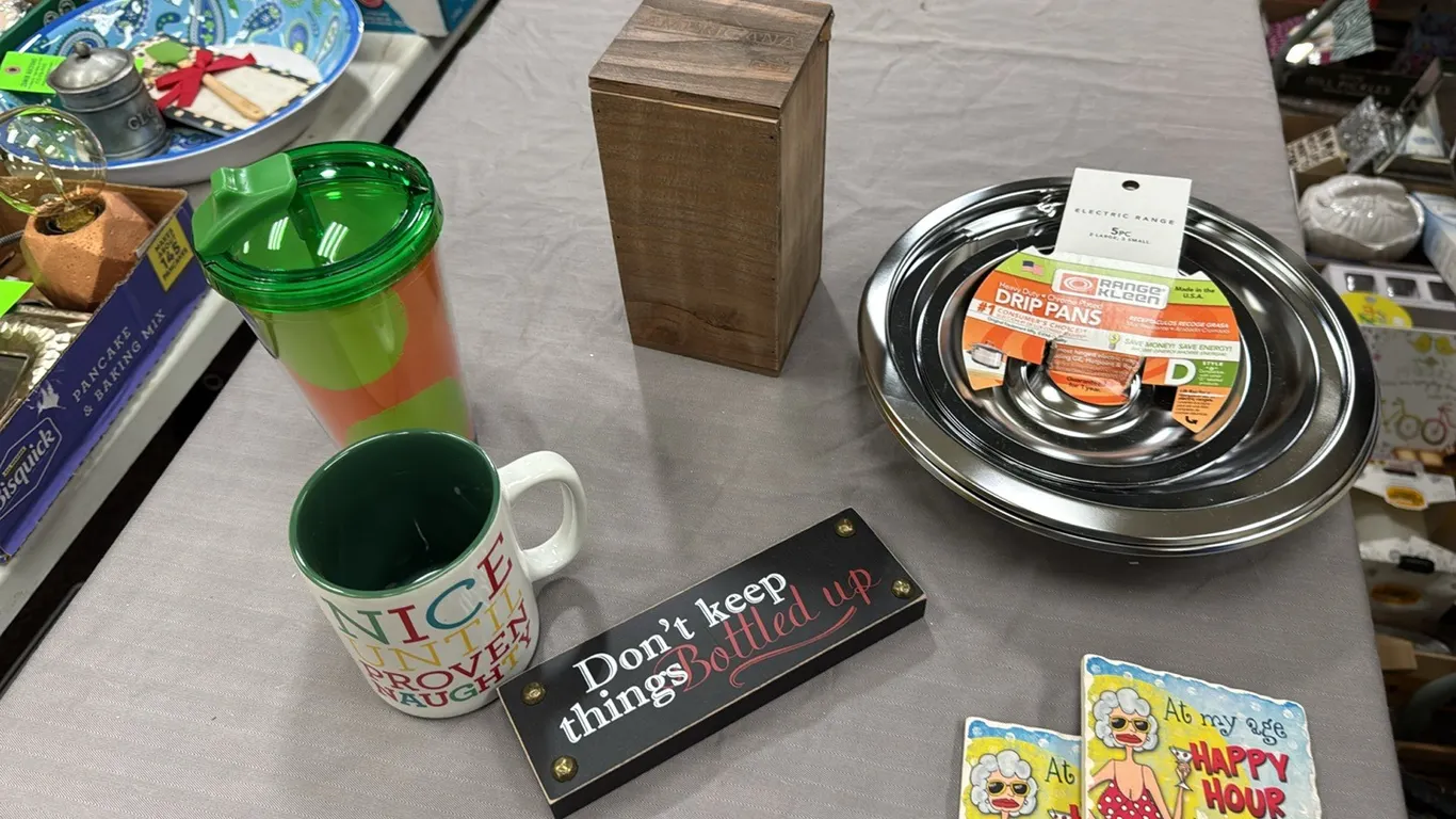 Drip pans, cup, drink glass, sign