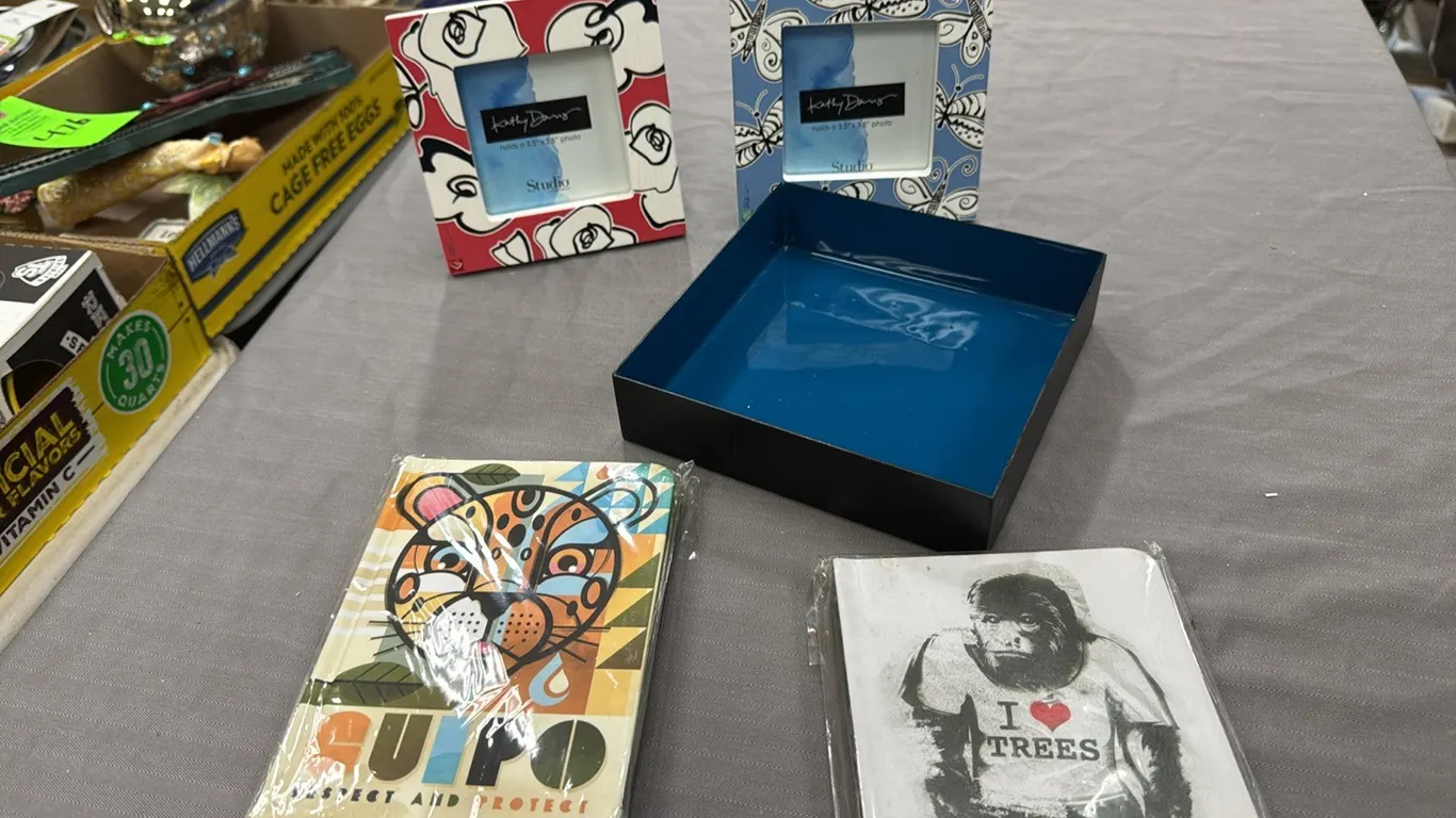 Metal tray, picture frames, notebooks