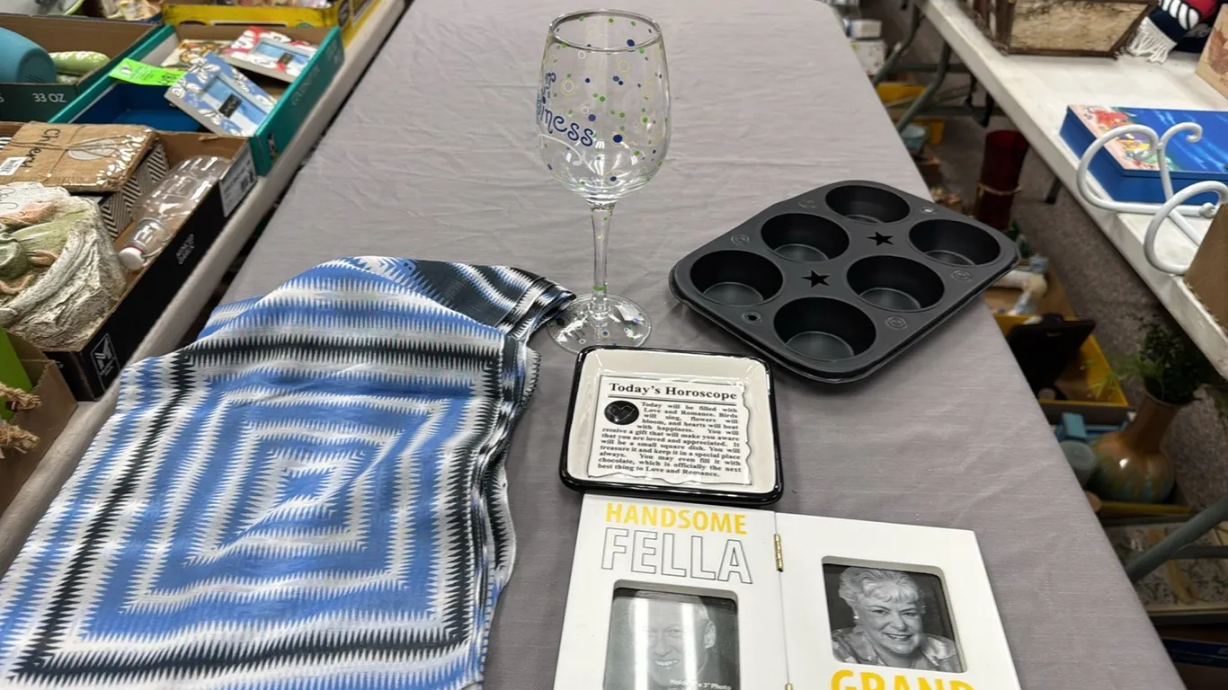 Picture frame, scarf, wine glass, muffin tin