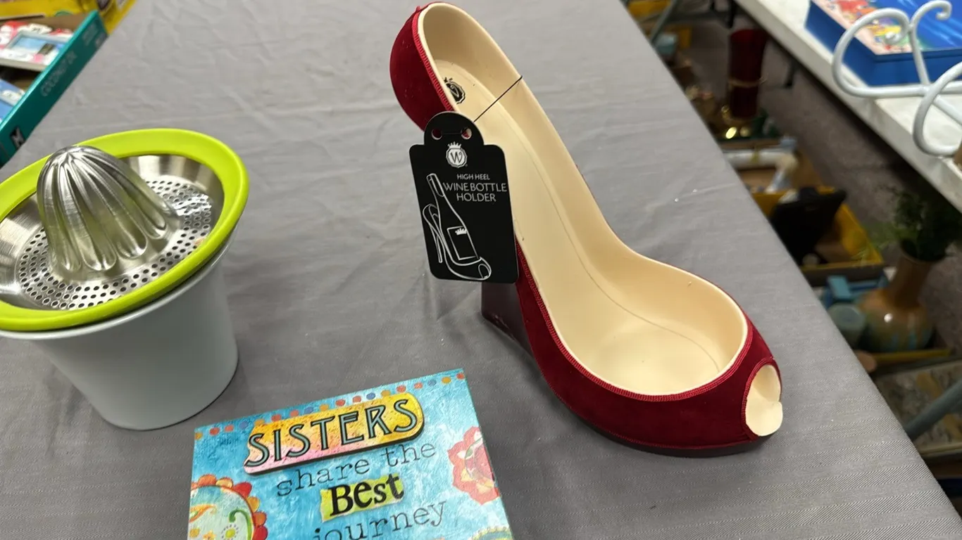 Wine bottle holder, juicer, cross, sign