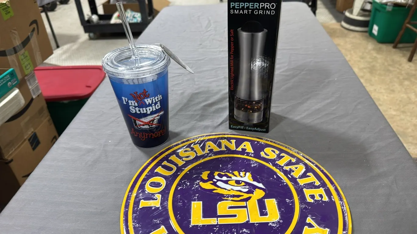 LSU sign, pepper grinder, drink glass