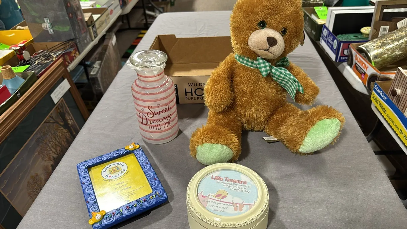 Stuffed rabbit, frame, treasure tin