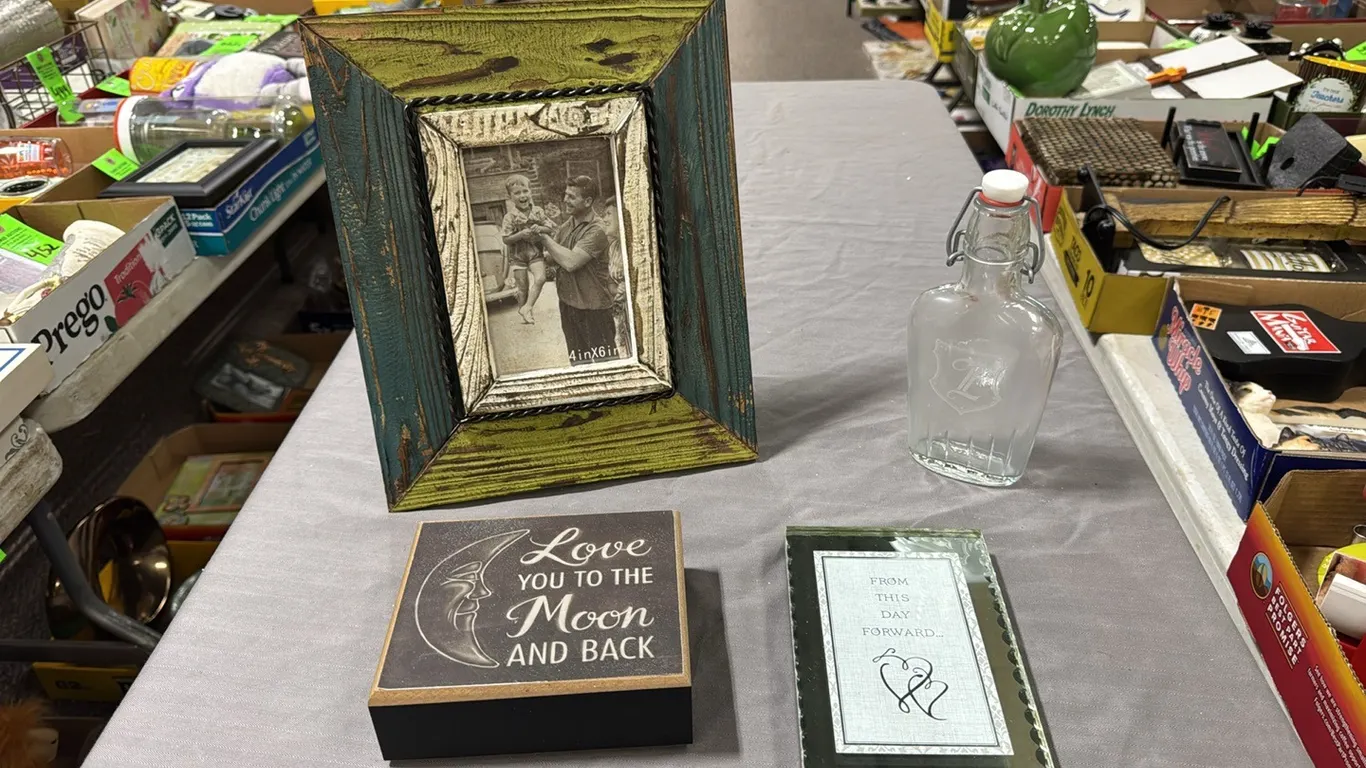 Picture frame, sign, bottle