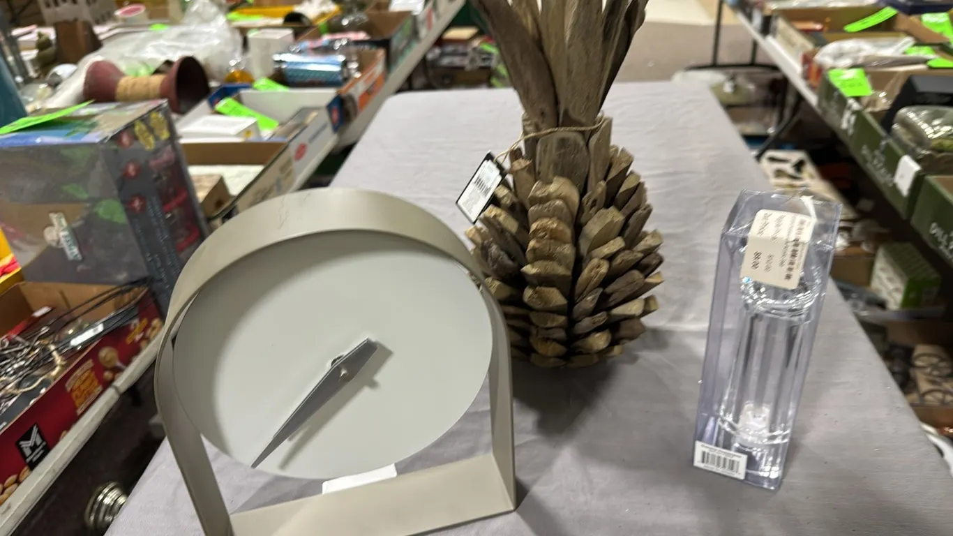 Clock, pineapple, pepper mill