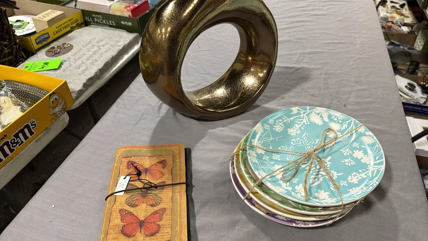 Plates, sphere, notebook