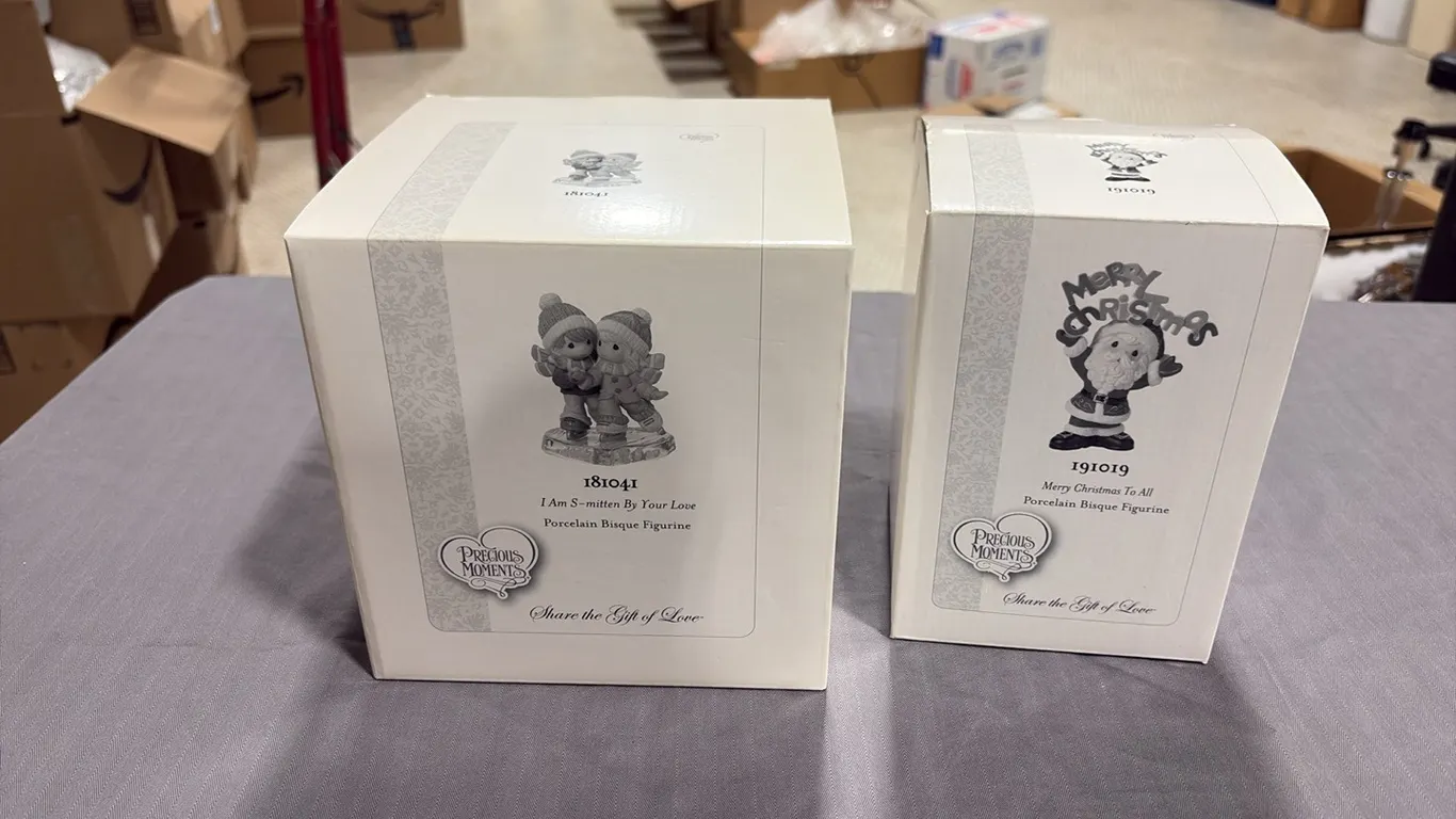 2- Precious Moments Figurines