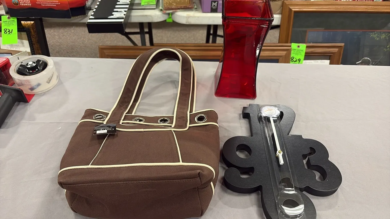 Brown Purse, Clock & Red Vase