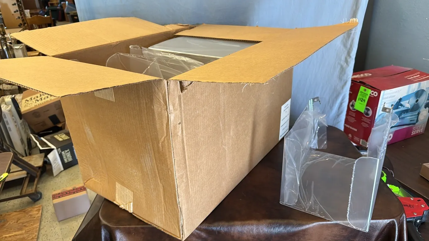 Box of pegboard paint roller displays