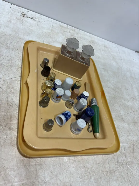 Thimbles and Old Perfume Bottles