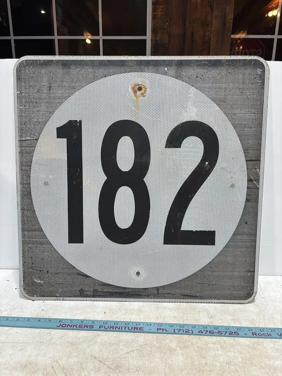 Rwtired Highway 182 Sign