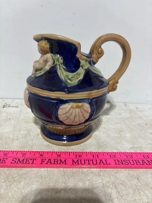 Cherub Pitcher