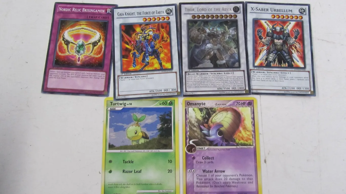 (4) Yu-Gi-Oh! Cards And (2) Pokemon Cards